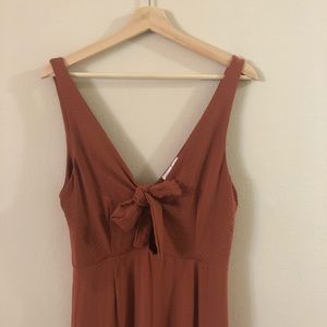 Jumpsuit with Adjustable Front Tie!